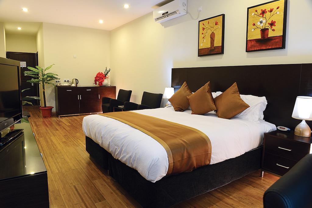 Timor Plaza Hotel & Apartments Дили Номер фото